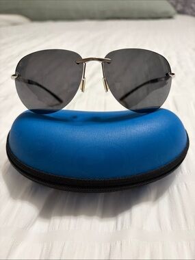 Costa Del Mar Rimless Aviator Sunglasses with Dark Gray Lenses